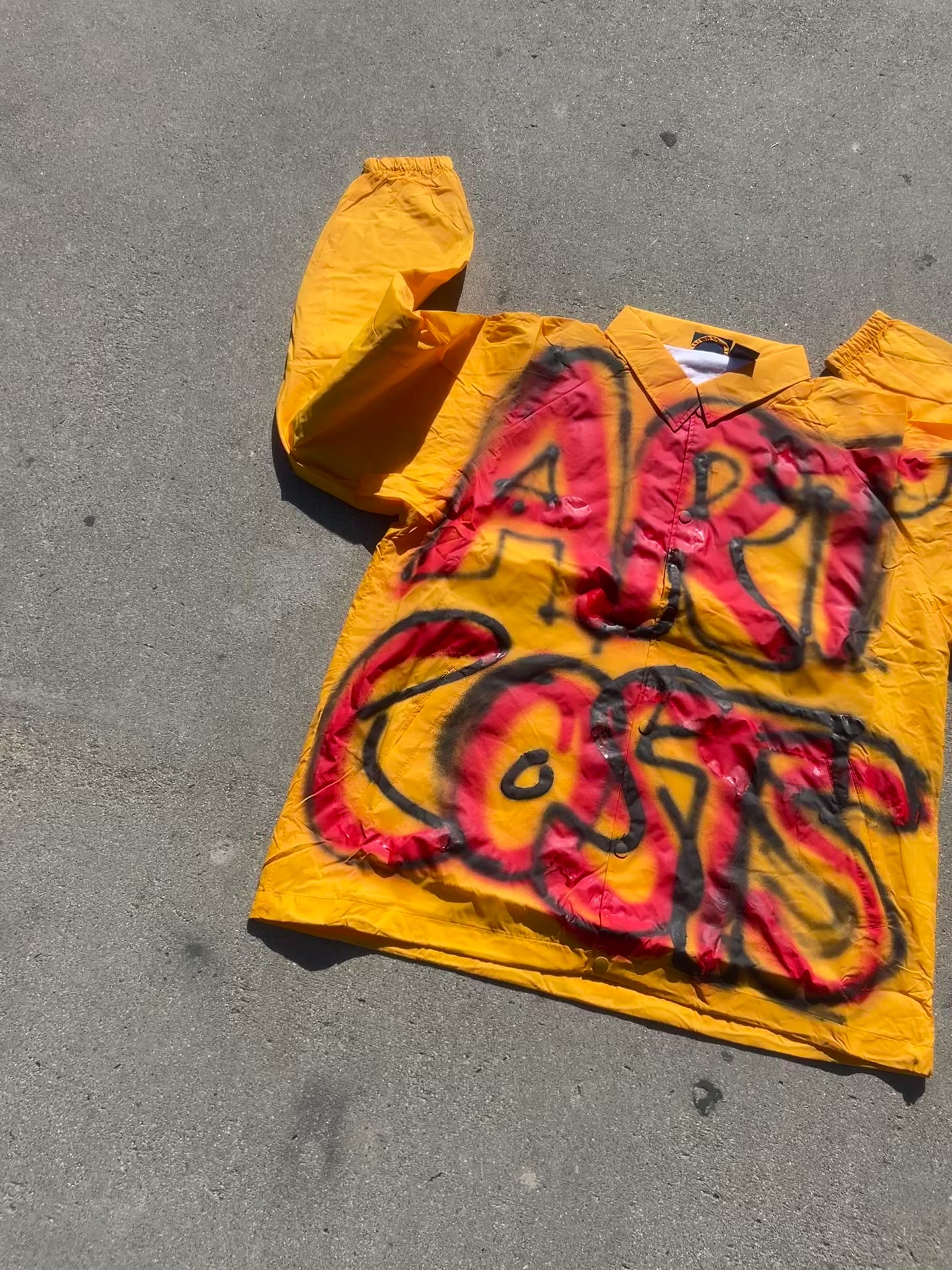 ART COSTS SIMPLE WINDBREAKER